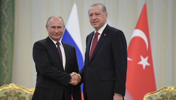 Президент РФ Владимир Путин и президент Турции Реджеп Тайип Эрдоган во время встречи. Архивное фото