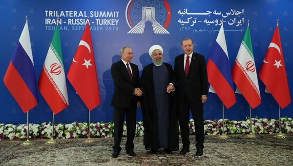 Президент России Владимир Путин, Иран Хасан Рухани и Турции Реджеп Тайип Эрдоган во время встречи в Тегеране. 7 сентября 2018