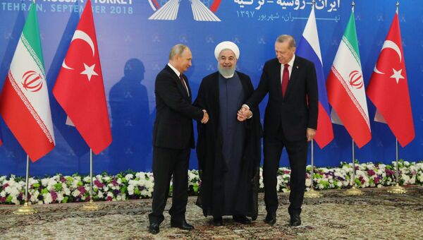 Владимир Путин, президент Ирана Хасан Рухани и президент Турции Реджеп Тайип Эрдоган во время встречи в Тегеране. 7 сентября 2018