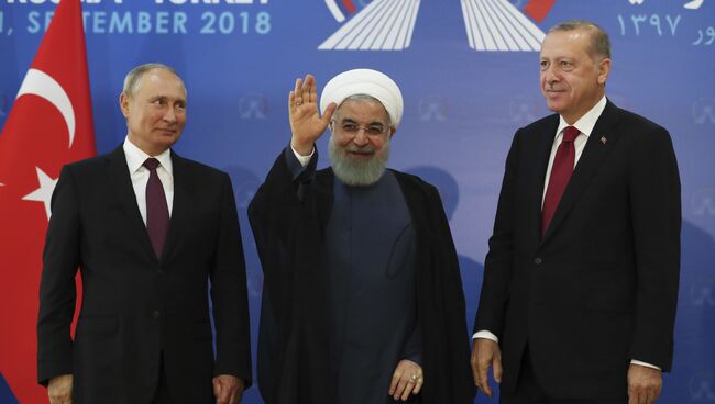 Президент России Владимир Путин, Иран Хасан Рухани и Турции Реджеп Тайип Эрдоган во время встречи в Тегеране. 7 сентября 2018
