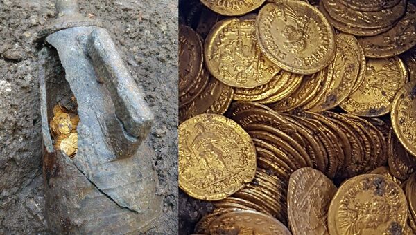 Амфора с кладом в несколько сотен золотых монет, обнаруженая археологами недалеко от итальянского озера Комо