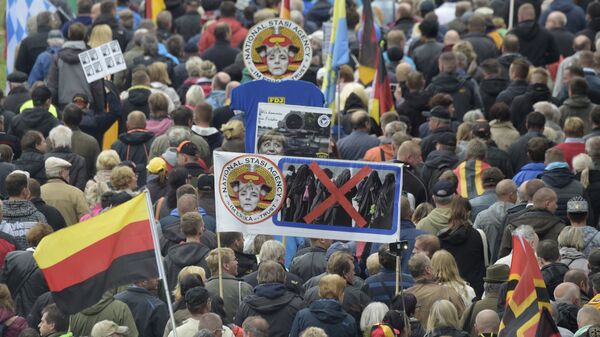 Активисты движения PEGIDA Патриотические европейцы против исламизации Запада во время митинга в Дрездене. Архивное фото