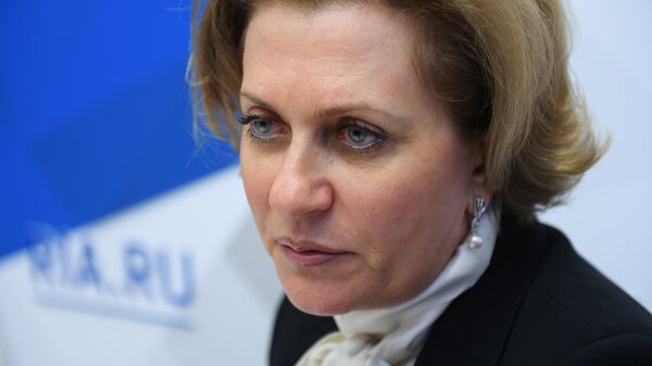 Анна Попова во время интервью на стенде Международного информационного агентства Россия сегодня на IV Восточном экономическом форуме
