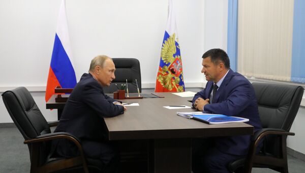 Президент РФ Владимир Путин и временно исполняющий обязанности губернатора Приморского края Андрей Тарасенко