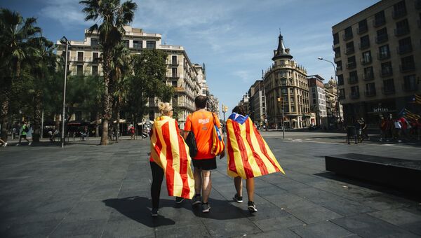 Участники акции сторонников независимости Каталонии в Барселоне. Архивное фото