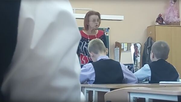 Стоп-кадр видеозаписи урока музыки в школе города Пушкин