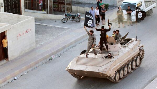 Боевики ИГ* в Ракке. Архивное фото