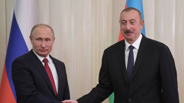 Президент РФ Владимир Путин и президент Азербайджана Ильхам Алиев во время встречи в Баку. 27 сентября 2018