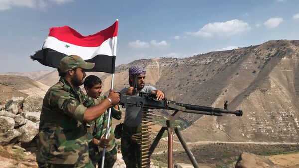 Сирийские военные установили государственный флаг на юго-западе провинции Дераа на границе с Иорданией. Архивное фото