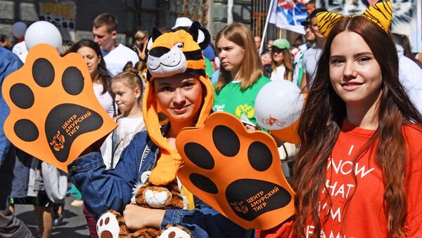 Участницы праздничных мероприятий, посвященных Дню тигра, во Владивосток