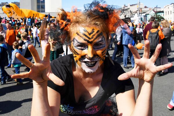 Участница праздничных мероприятий, посвященных Дню тигра, во Владивостоке
