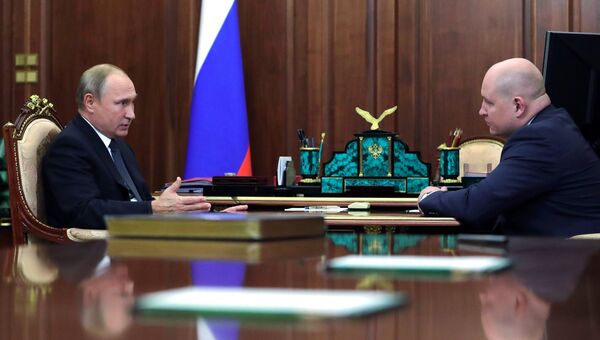 Владимир Путин и Михаил Развожаев во время встречи. 3 октября 2018