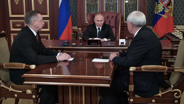 Президент РФ Владимир Путин во время встречи с Александром Бегловым и Георгием Полтавченко в Санкт-Петербурге. 3 октября 2018