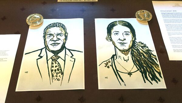 Рисунки с портретами лауреатов Нобелевской премии мира 2018 Дениса Муквеге и Нади Мурад
