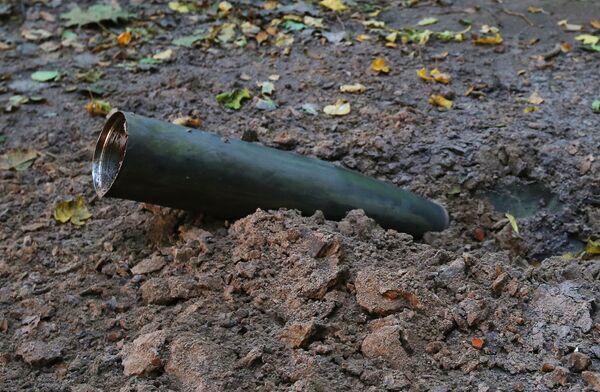 Оболочка снаряда в лесу после взрыва на военном складе под Черниговом. 9 октября 2018 Оболочка снаряда в лесу после взрыва на военном складе под Черниговом. 9 октября 2018