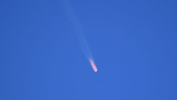 Ракета-носитель Союз-ФГ с пилотируемым кораблем Союз МС-10 после старта с космодрома Байконур
