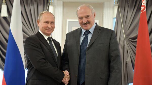  Владимир Путин и президент Республики Беларусь Александр Лукашенко во время встречи в Могилеве. 12 октября 2018