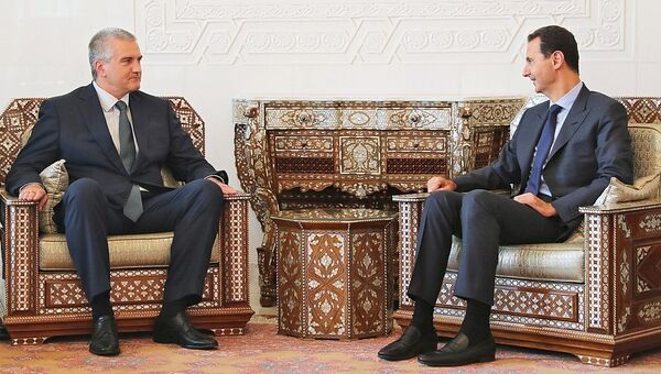 Глава Республики Крым Сергей Аксёнов и президент Сирийской арабской республики Башар Асад во время встречи в Дамаске. 16 октября 2018