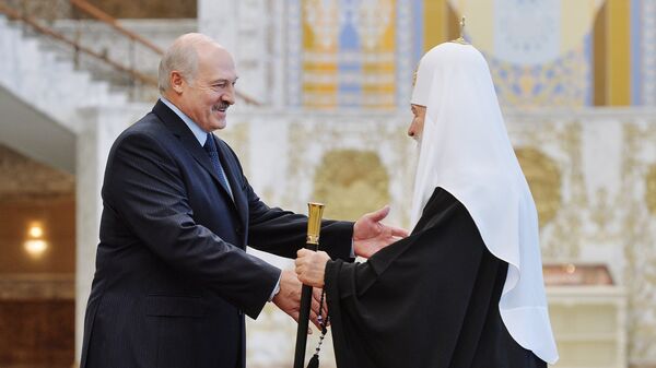 Патриарх Московский и всея Руси Кирилл и президент Белоруссии Александр Лукашенко во время встречи в Минске