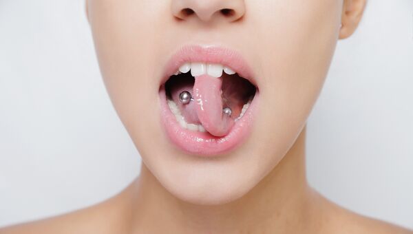 Может ли пирсинг повлиять на здоровье полости рта?