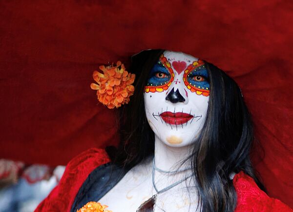 Участница карнавала Катрина в Мехико