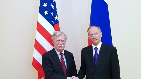 Секретарь Совета безопасности РФ Николай Патрушев  и советник президента США по вопросам национальной безопасности Джон Болтон во время встречи в Москве. 22 октября 2018