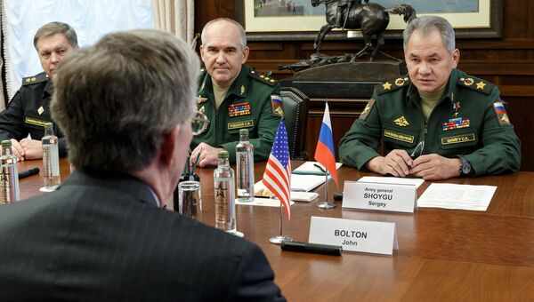 Министр обороны РФ Сергей Шойгу во время встречи с советником президента США Джоном Болтоном. 23 октября 2018
