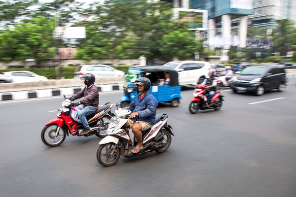 Мотоциклисты на улице Джакарты