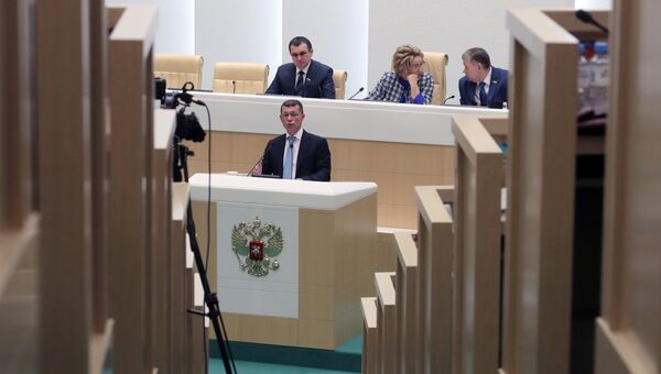 Министр труда и социальной защиты РФ Максим Топилин выступает на пленарном заседании Совета Федерации РФ в Москве. 24 октября 2018