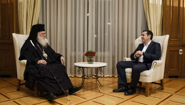 Премьер-министр Греции Алексис Ципрас и архиепископ Афинский и всей Греции Иероним во время встречи. 6 ноября 2018