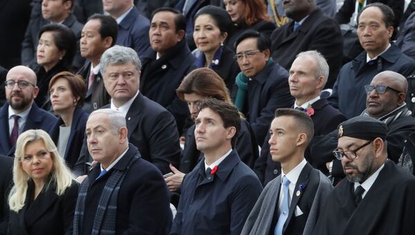 Главы государств и правительств на мемориальной церемонии у Триумфальной арки в Париже по случаю 100-летия окончания Первой мировой войны. 11 ноября 2018