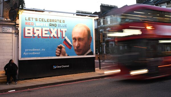 Плакат с портретом президента РФ Владимира Путина в Лондоне. 8 ноября 2018