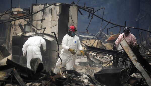 Спасатели ликвидируют последствия лесного пожара в городе Парадайз в штате Калифорния. Архивное фото