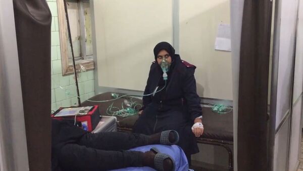 Пострадавших от химатаки в Алеппо привезли в больницу. Съемка Минобороны РФ