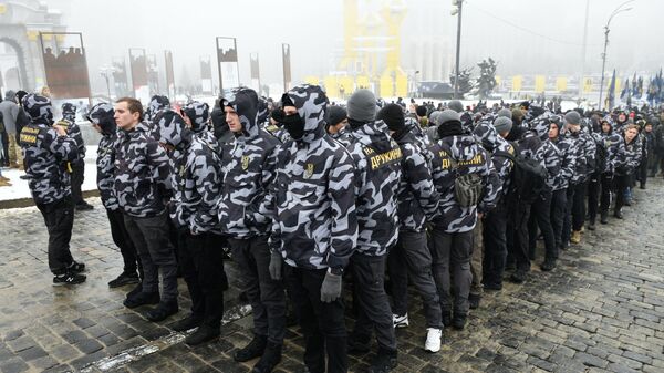 Участники акции за введения военного положения на Украине, организованной партией Национальный корпус в Киеве. 26 ноября 2018