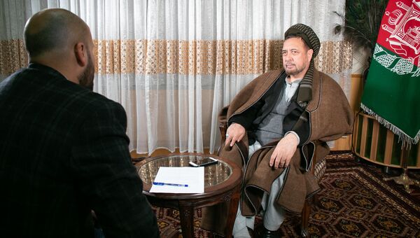 Вице-премьер Афганистана Мохаммад Мохакак во время интервью РИА Новости