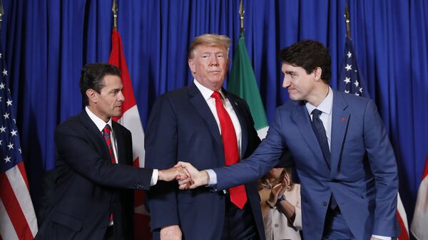 Глава Мексики Энрике Пенья Ньето, президент США Дональд Трамп  и премьер-министр Канады Джастин Трюдо после подписания торгового соглашения USMCA. 30 ноября 2018