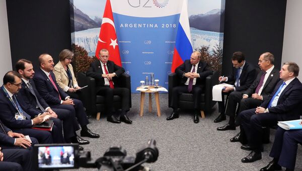 Президент РФ Владимир Путин и президент Турции Реджеп Тайип Эрдоган во время встречи на полях саммита Группы двадцати G20 в Буэнос-Айресе. 1 декабря 2018