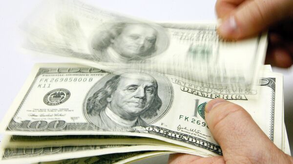 Доллар подешевел к мировым валютам на опасениях за техдефолт в США