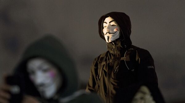 Участники акции протеста, организованной движением Anonymous