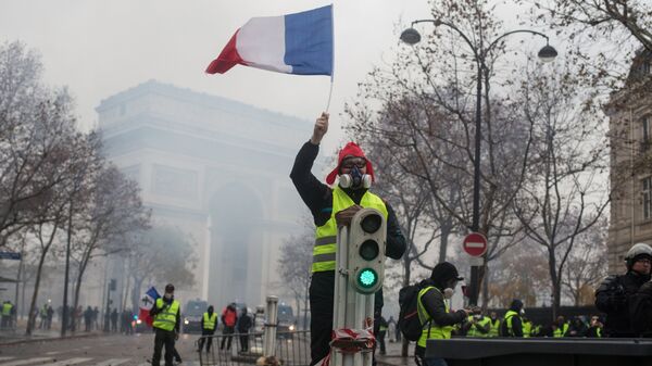 Акция протеста движения желтые жилеты в Париже. Архивное фото
