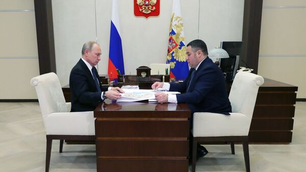 Президент РФ Владимир Путин и губернатор Тверской области Игорь Руденя во время встречи. 4 декабря 2018