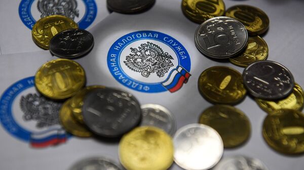 Монеты России и конверты с логотипом ФНС РФ