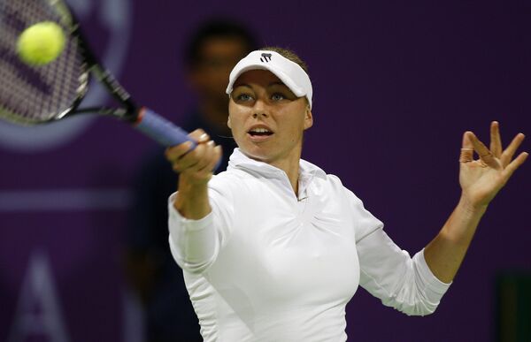 Вера Звонарева в матче с Еленой Янкович на турнире в Дохе