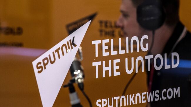 Стенд Информационного агентства и радио Sputnik