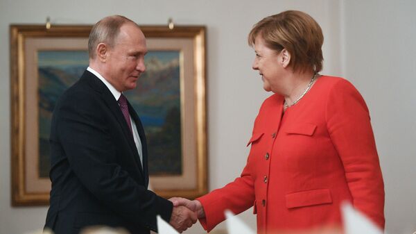  Президент РФ Владимир Путин и канцлер ФРГ Ангела Меркель во время встречи на полях саммита Группы двадцати в Буэнос-Айресе