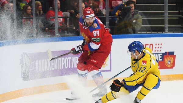 Игровой момент матча Швеция - Россия