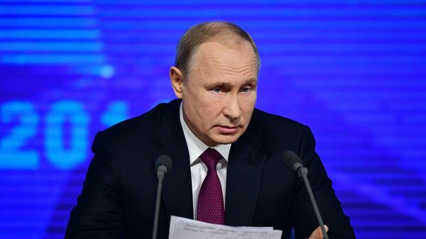 Президент РФ Владимир Путин на четырнадцатой большой ежегодной пресс-конференции в Центре международной торговли на Красной Пресне