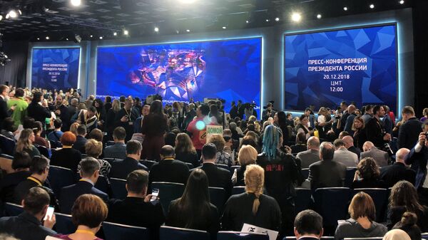 Журналисты перед началом ежегодной большой пресс-конференции президента РФ Владимира Путина 
