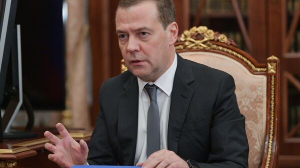Председатель правительства РФ Дмитрий Медведев во время встречи с президентом РФ Владимиром Путиным